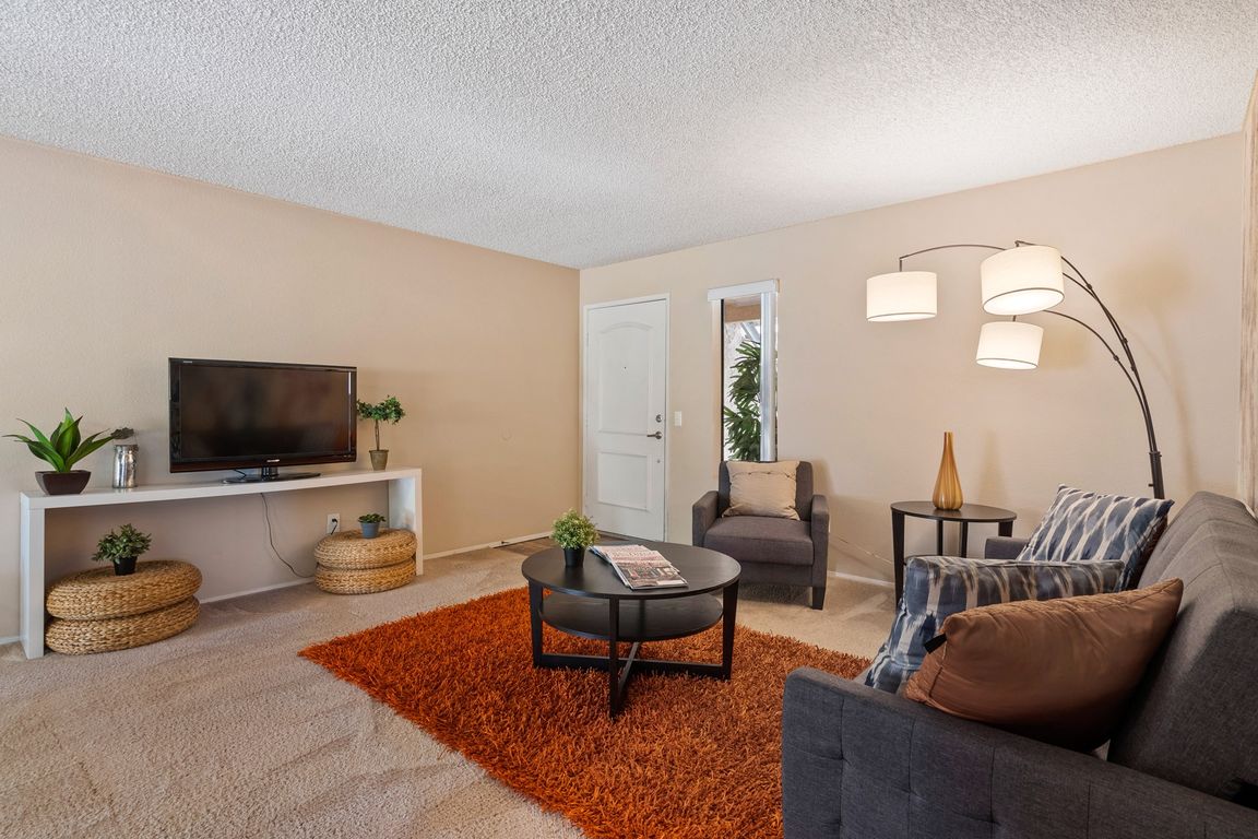 Welcoming living room at River Oaks in Oceanside, CA