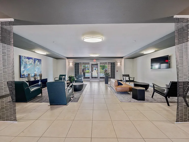 Modern resident lounge with cozy seating areas