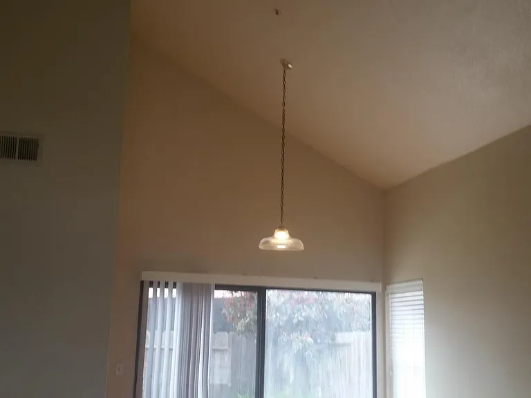 Vaulted ceiling in first level, laminate flooring. Sliding door leads to large patio deck and fenced backyard for relaxing.