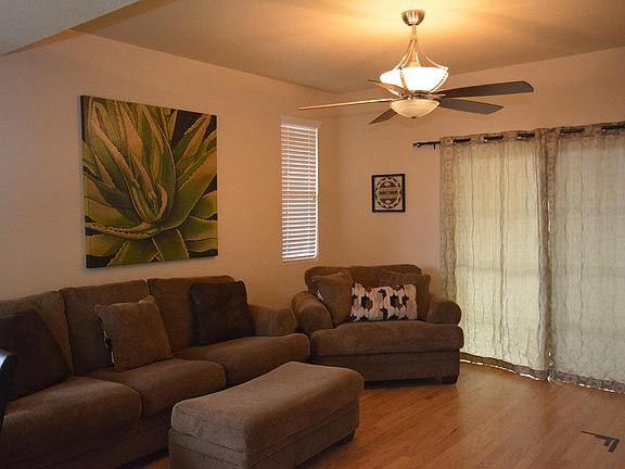 Living room has direct access to the wrap-around deck