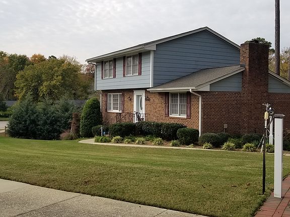 Nice brick walkway to front entrance with solar and traditional lighting. Professional landscaping and lawn care included.