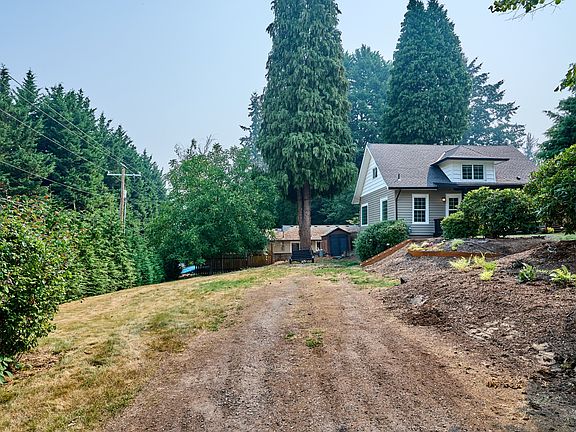 Second driveway & parking on this large side yard