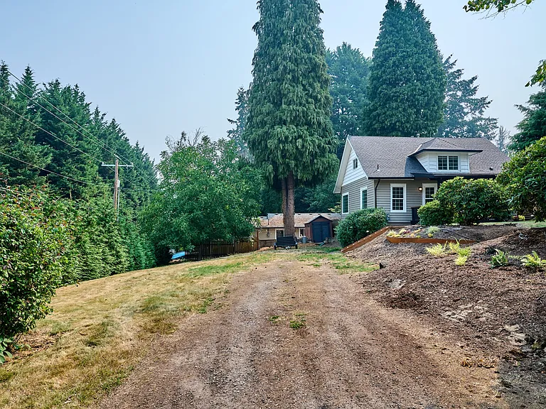 Second driveway & parking on this large side yard