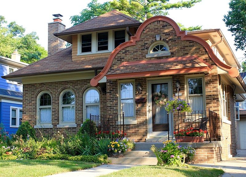 Exterior - Front : Lovely detail over porch and foyer. Exterior newly repainted 2015.