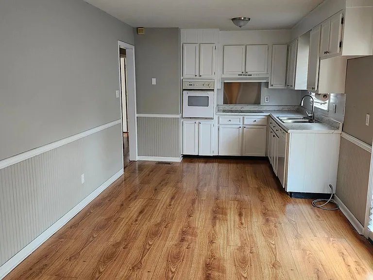 Kitchen: View from carport and laundry room