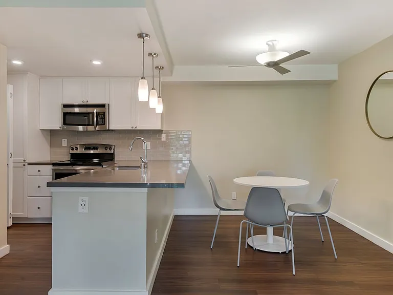 Furnished+ apartment homes include a dining set (Representative Image exact items and style of furnishings may vary)
