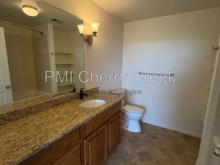 3890 S Dayton St #108 — Photo 22