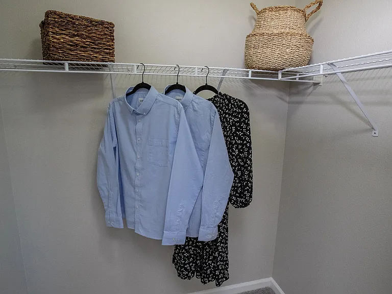 Maximize your storage with generous walk-in closets equipped with built-in shelving, offering multiple storage options and wardrobe organization.