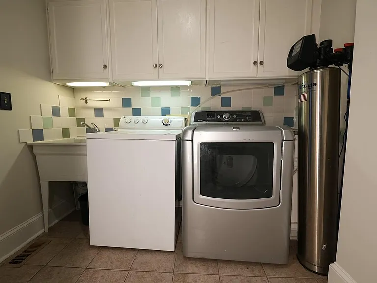 Laundry area with large sink