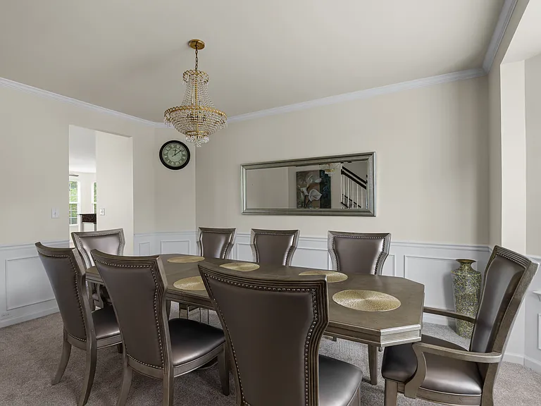 Formal Dining _ Shown furnished. If a furnished rental arrangement is agreed upon, the room would be presented as shown.