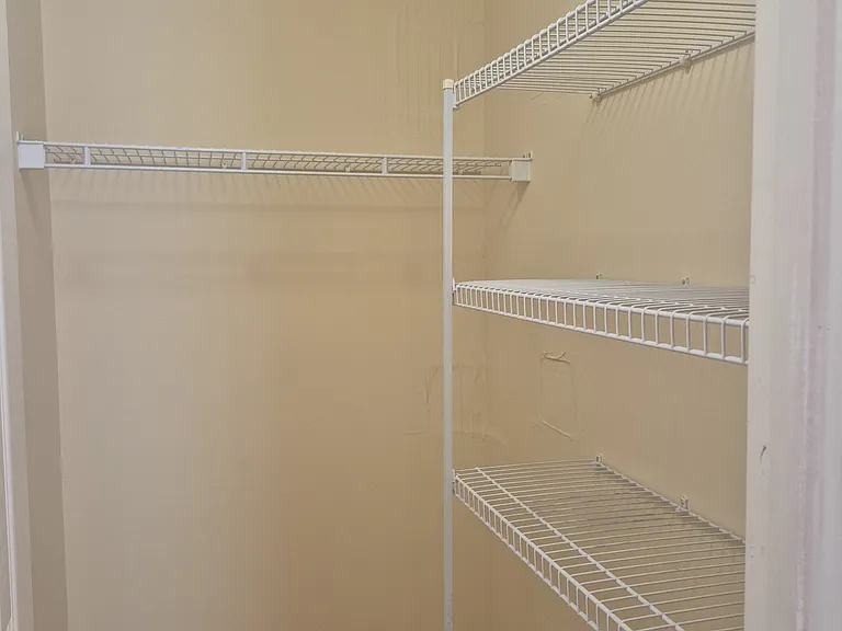 Primary closet (His closet)