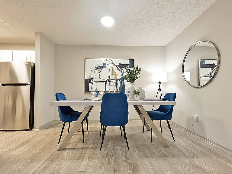 Dining area with hardwood-style flooring