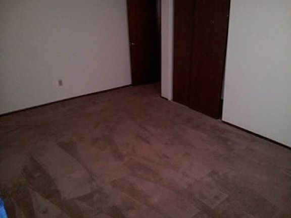 Bedroom has laminate flooring now