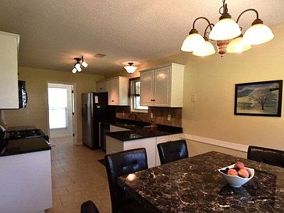 Tile in Kitchen and Laundry
