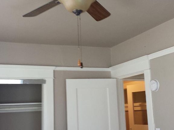 Bed room closet, can see utility entrance door