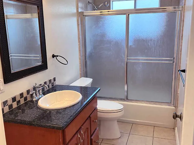 Full bathroom off main hallway.