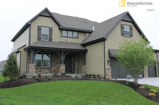 Photos are of a Model home. The actual home elevation may vary f