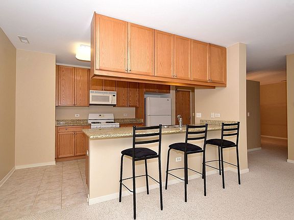 4th image of 7243 Madison St APT 208