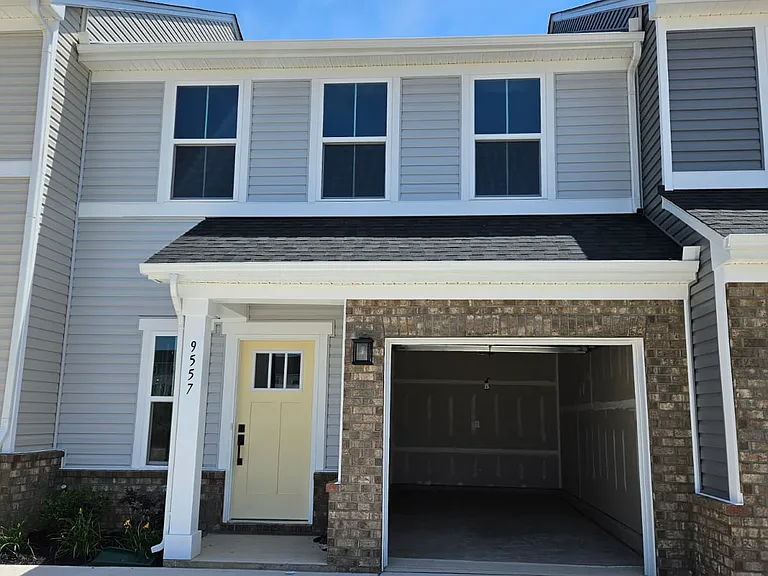 Front entrance with one car garage and space for two car parking on the driveway