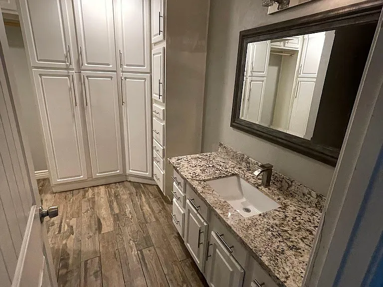 Primary Bathroom & custom walk-in Primary Closest attached to Primary Bedroom
