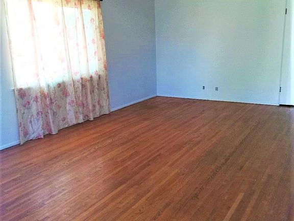 Living room with hardwood flooring