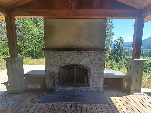 Fireplace view to Stamped Concrete Patio