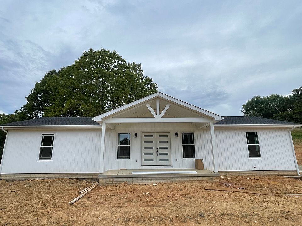 Front view of home; sidewalk to be poured and landscaping to be installed.