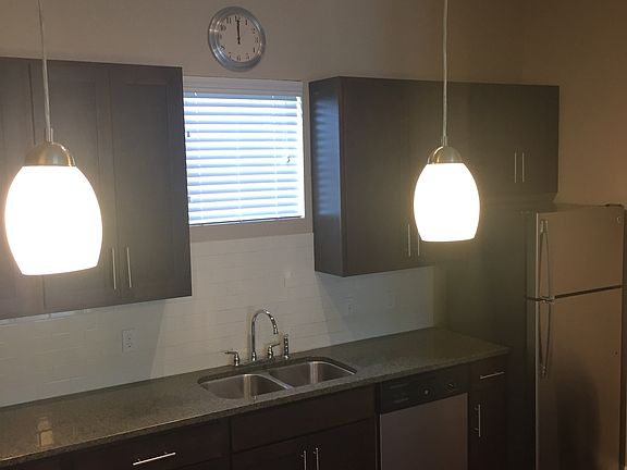 Notice the stainless steel appliances