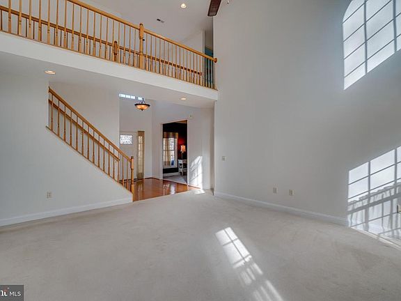 View of stairs and walkway from family room