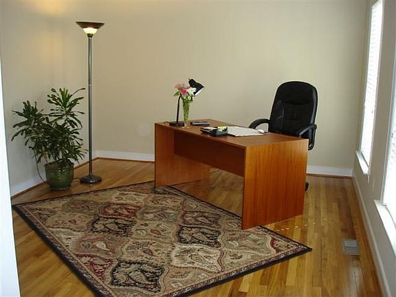 Living room or office.....newly refinished hardwood and paint
