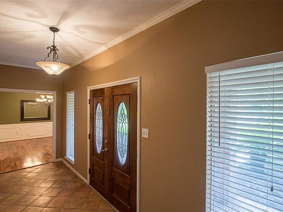 Immediately to the right of entry is formal dining room