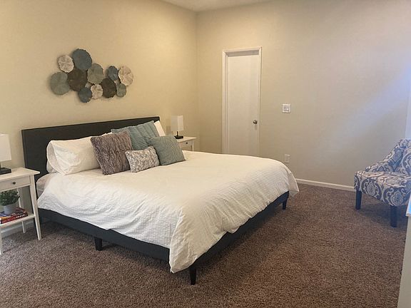 Large primary bedroom with huge walk-in closet