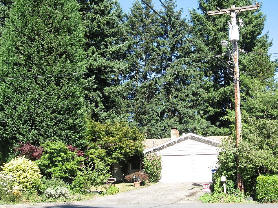 Front of home with trees