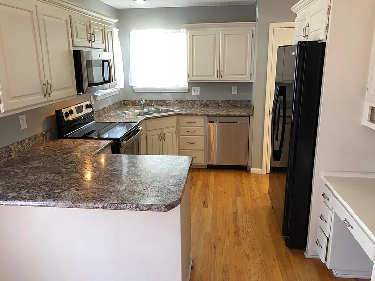 Kitchen with built-in desk, pantry, breakfast bar!!