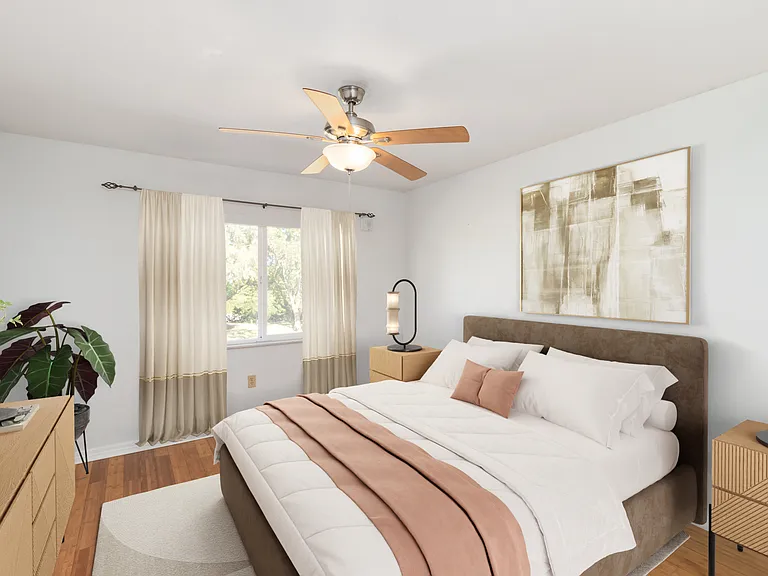 Primary Bedroom- with lake view and WIFI electric blinds.