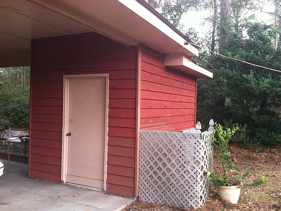 Storage attached to carport