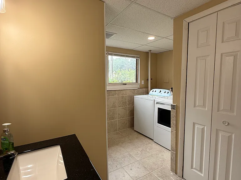 Lower level full bathroom and laundry (#2 bathroom)