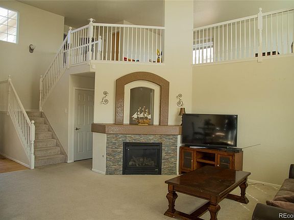 Stunning vaulted living area with custom paint and fireplace