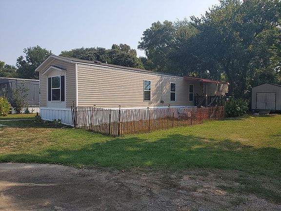 Fenced & covered back porch 