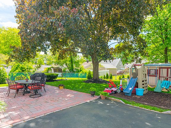 Patio and play area + yard