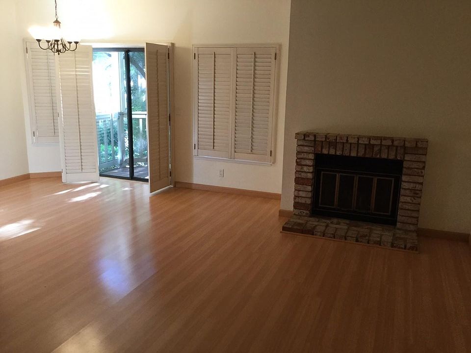 Cozy living room that flows into the dining area.