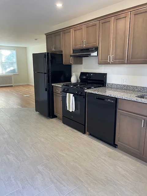 Kitchen Area with New Appliances, Cabinets, Counter Tops and Floor - 125 Gallagher Ave #5