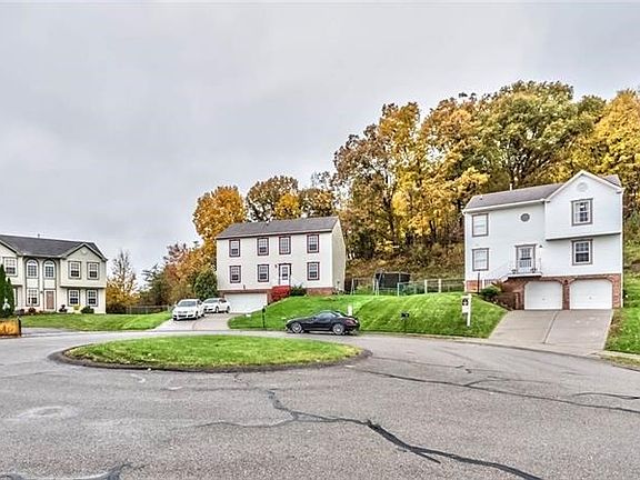 Located on this grassy cul de sac...the perfect place for neighborhood gatherings, play time, and social events.