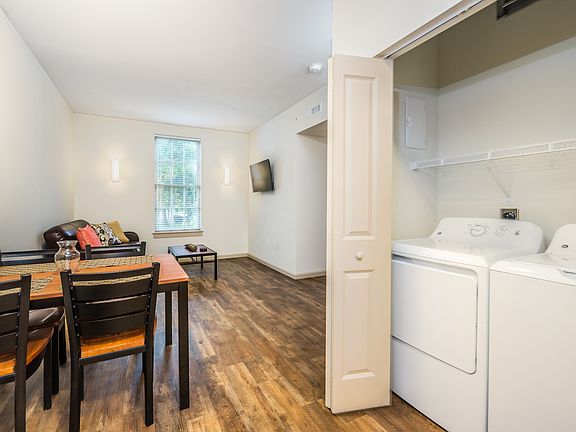 dining area with laundry closet