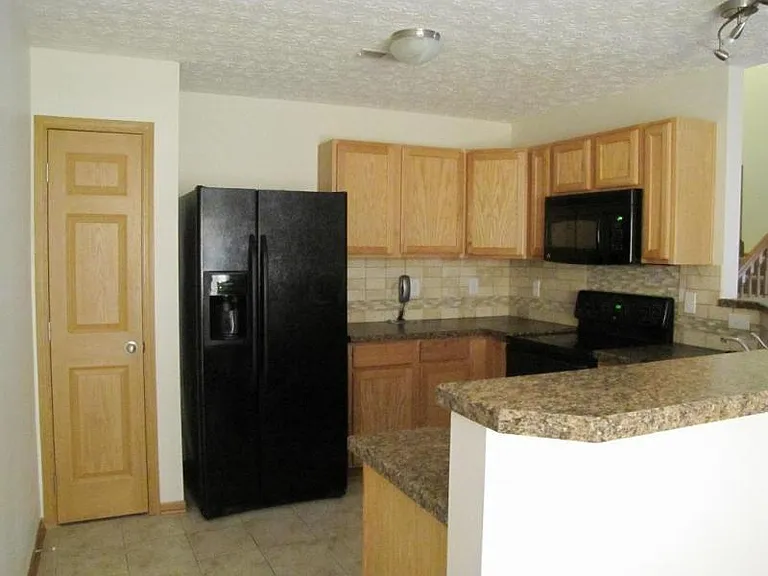 Kitchen with new custom back-splash