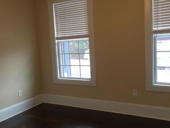 Bedroom with tray ceilings