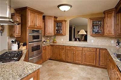 This kitchen is a cooks delight. It includes a warming oven, 5 burner cook top, Braun hood vent, dou