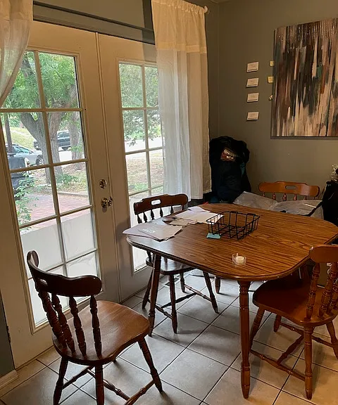Area near the patio doors that can be used for a dining room table or many residents have used it for a study area.