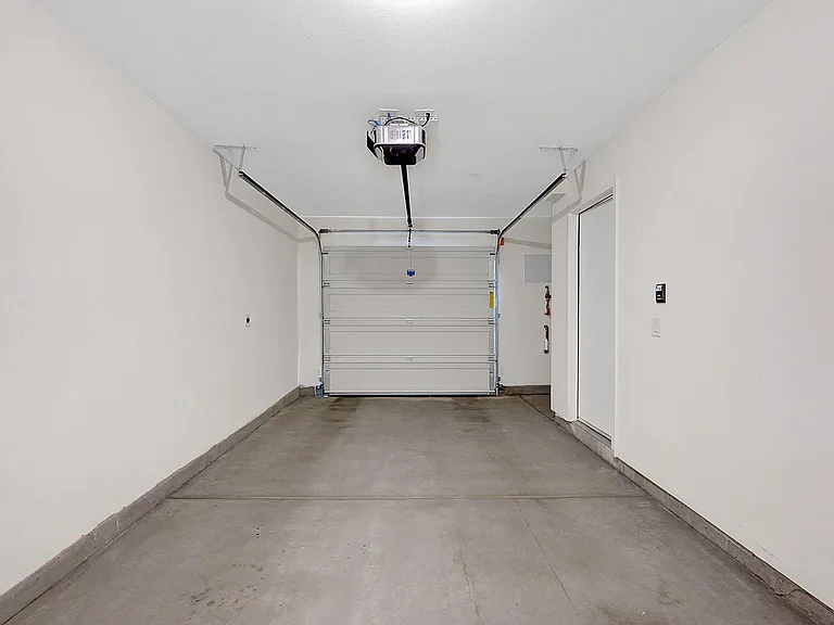 Explore the convenience of a spacious and modern garage, perfect for secure parking and storage.