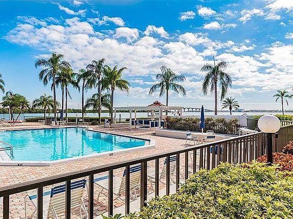 Beautiful bayfront pool and hot tub.